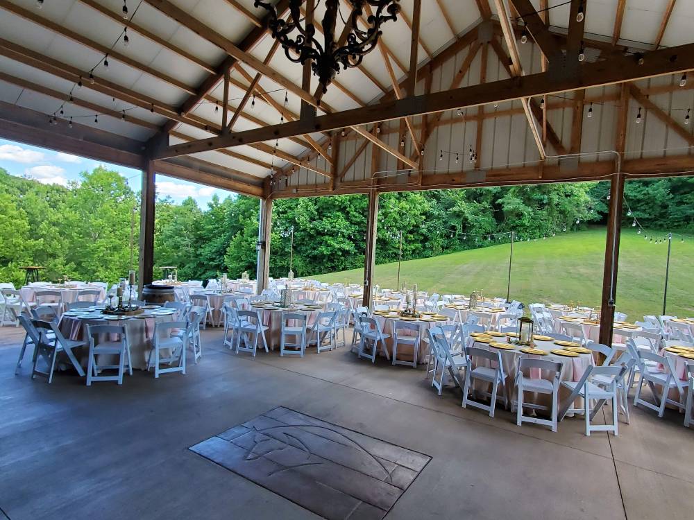 Tables set up at an indoor-outdoor Knoxville wedding venue